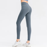 Hoog getailleerde gekruiste effen legging