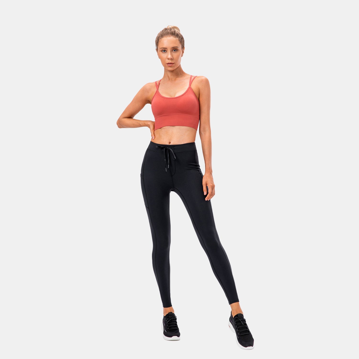 Sportlegging met hoge taille en zak met trekkoord