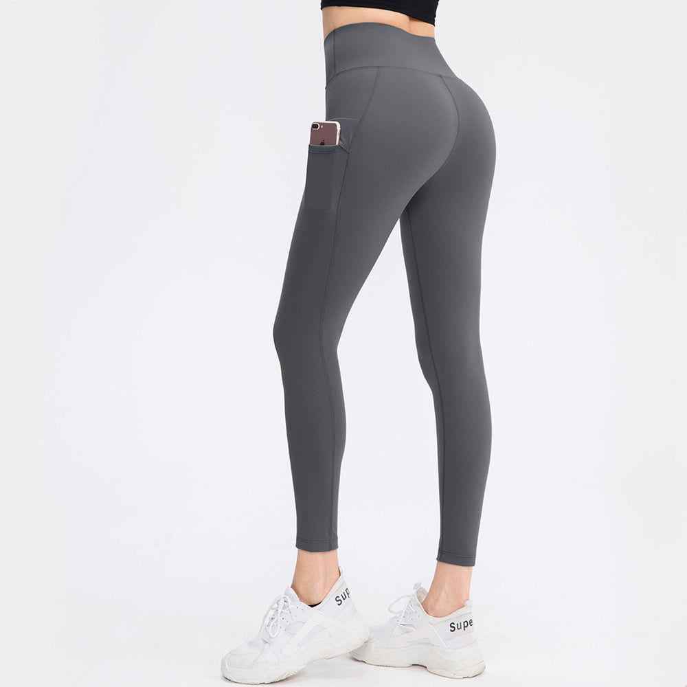 Hoog getailleerde effen legging met dubbele zak