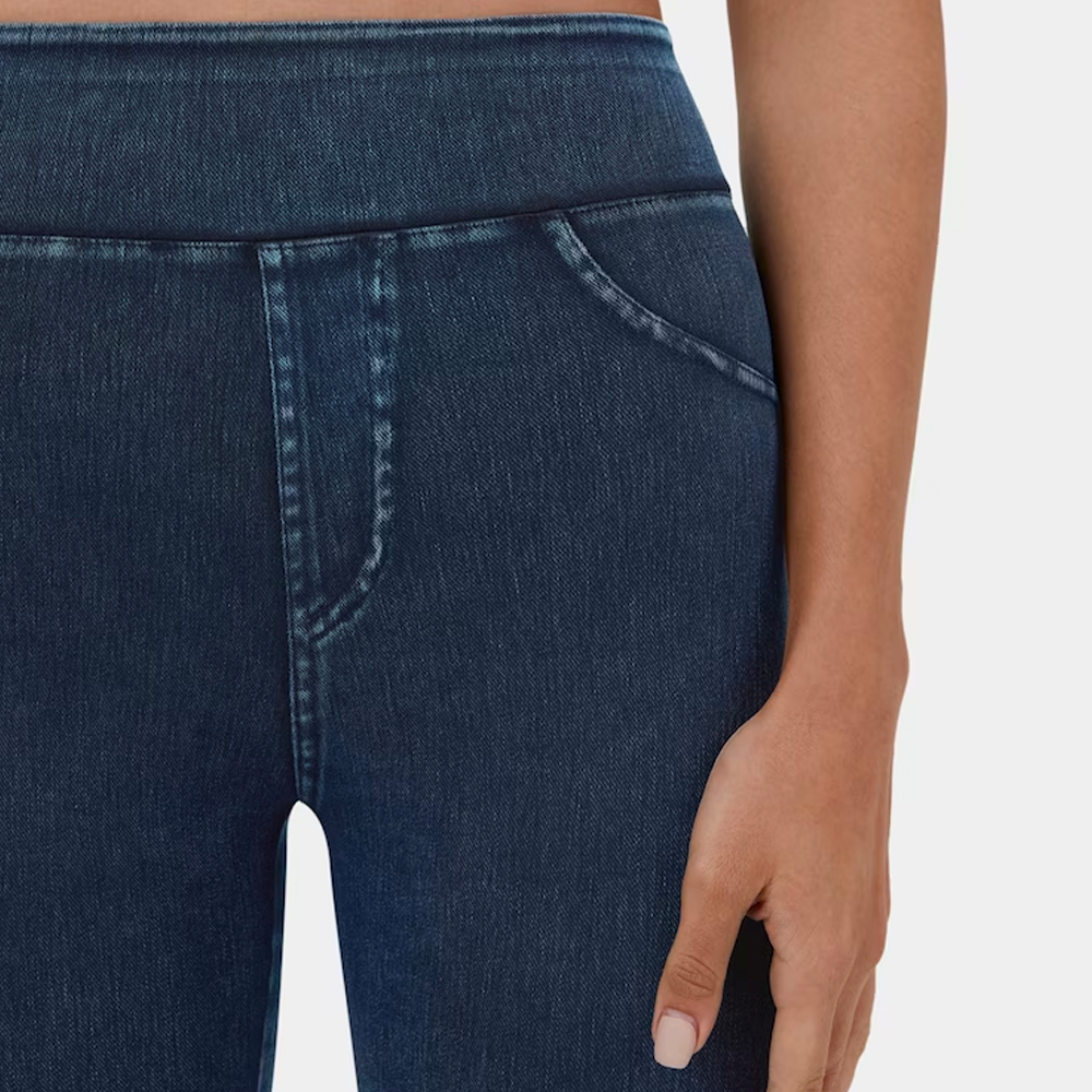 Hoog getailleerde elastische denimlegging