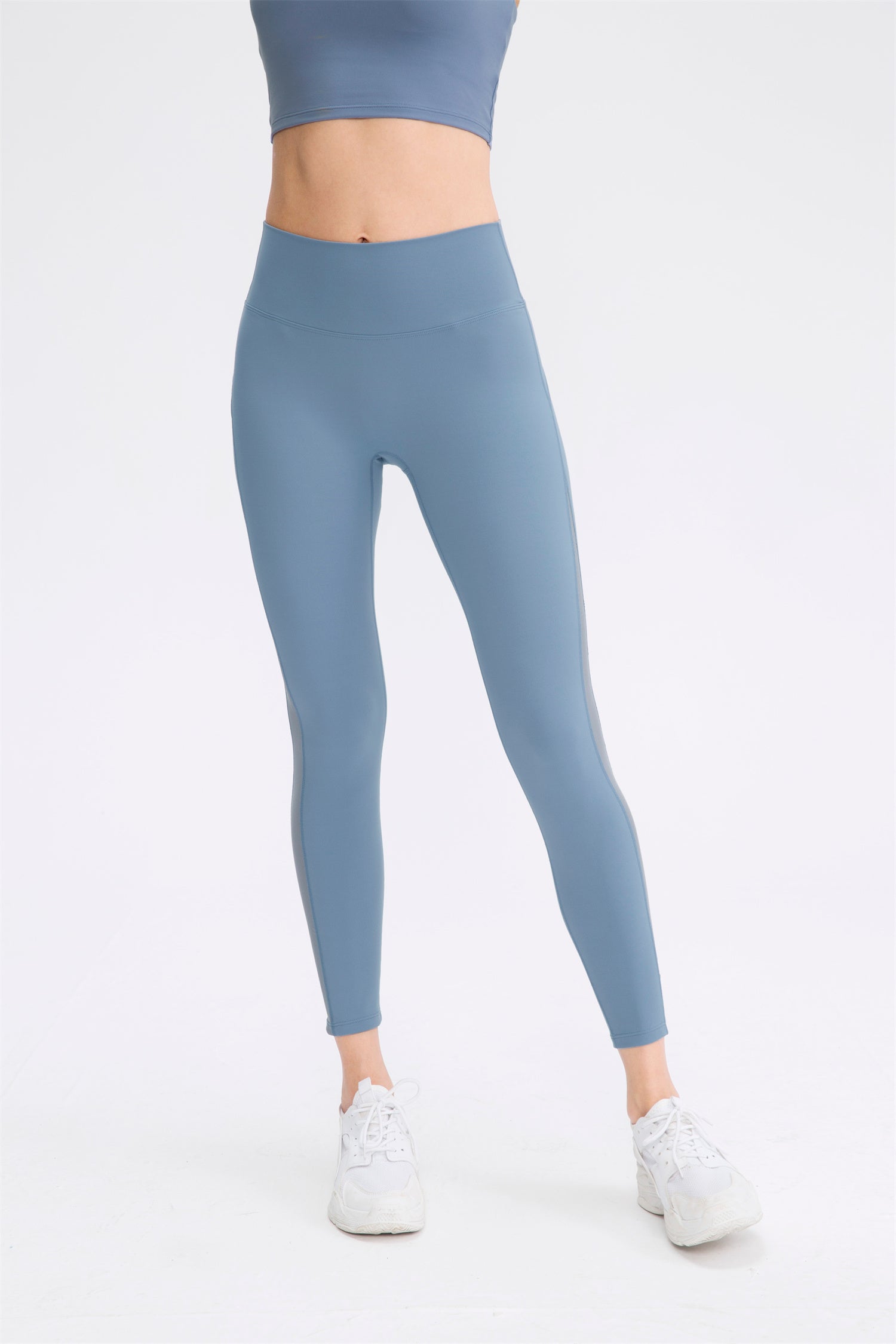 Hoog getailleerde sportlegging van mesh