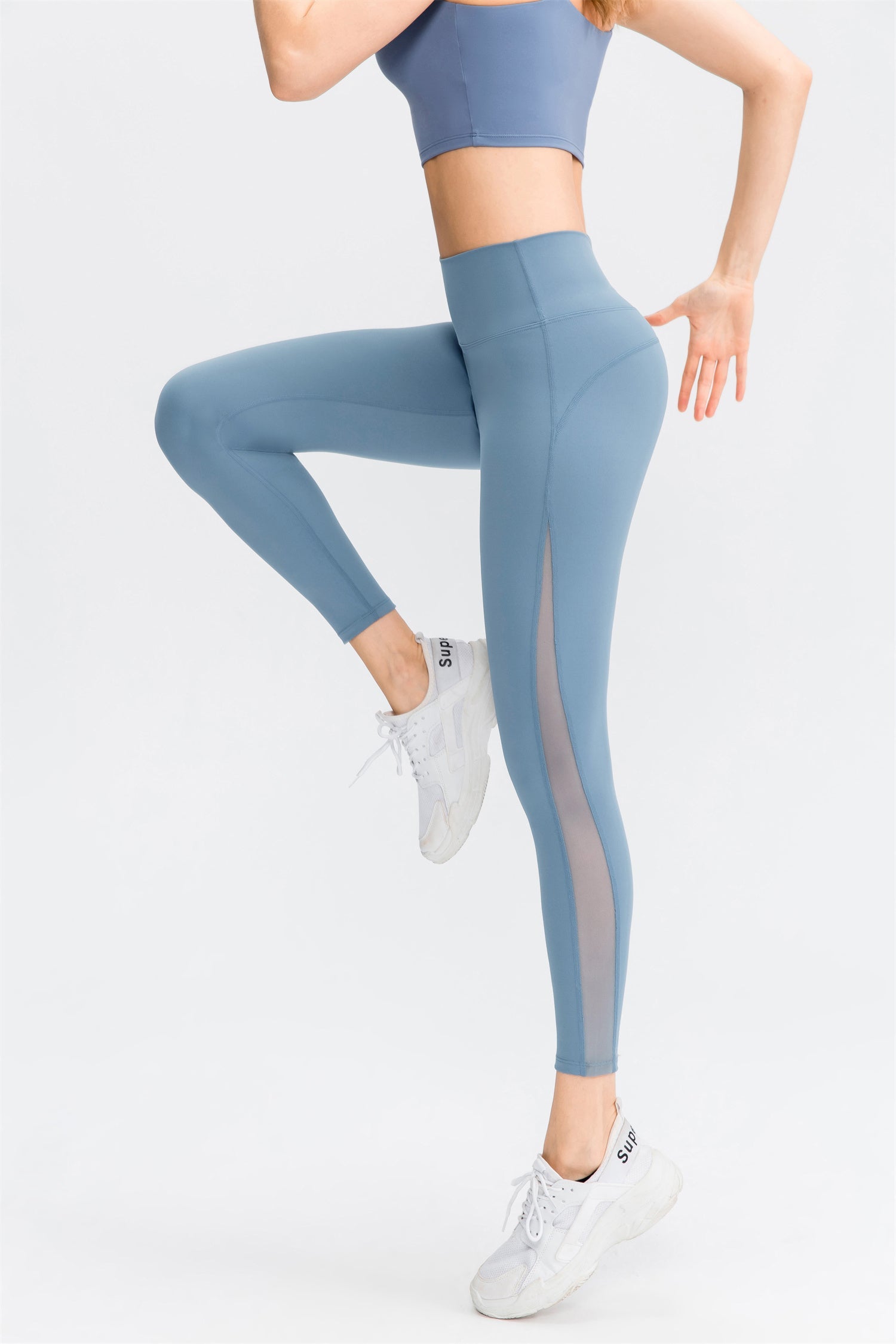 Hoog getailleerde sportlegging van mesh
