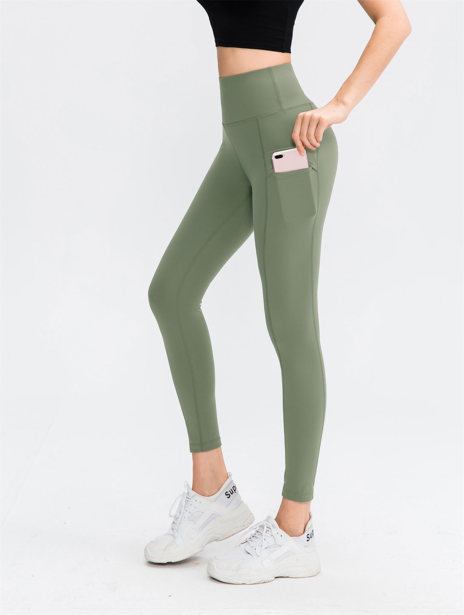 Hoog getailleerde effen legging met dubbele zak