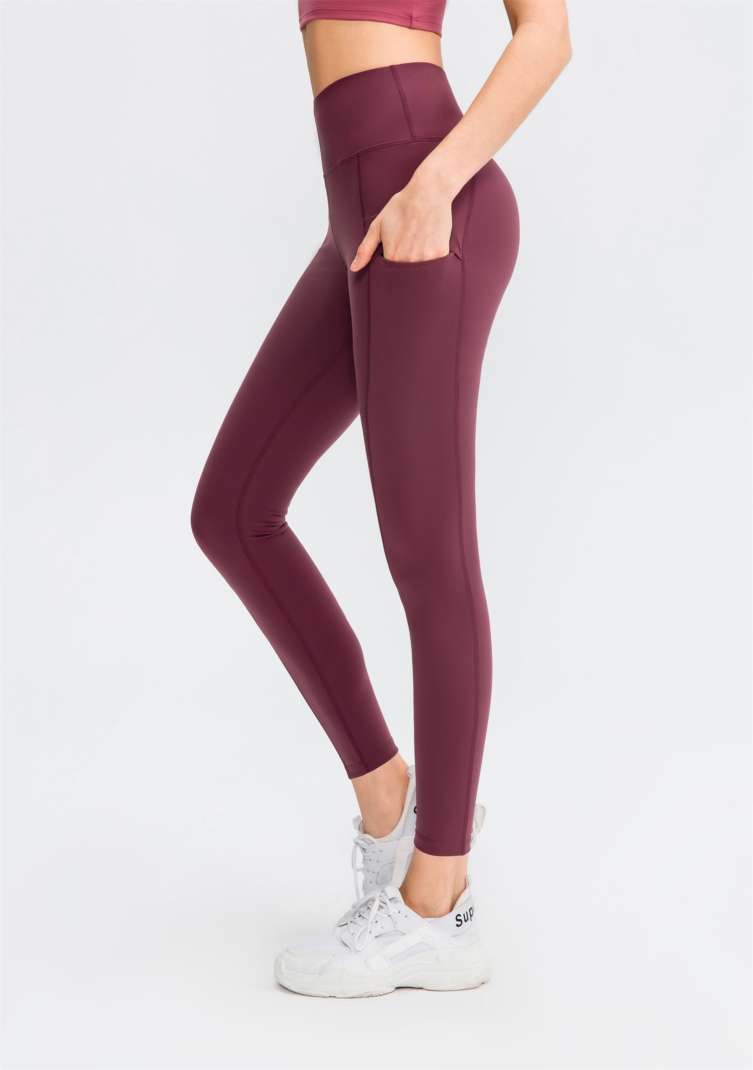Hoog getailleerde effen legging met dubbele zak