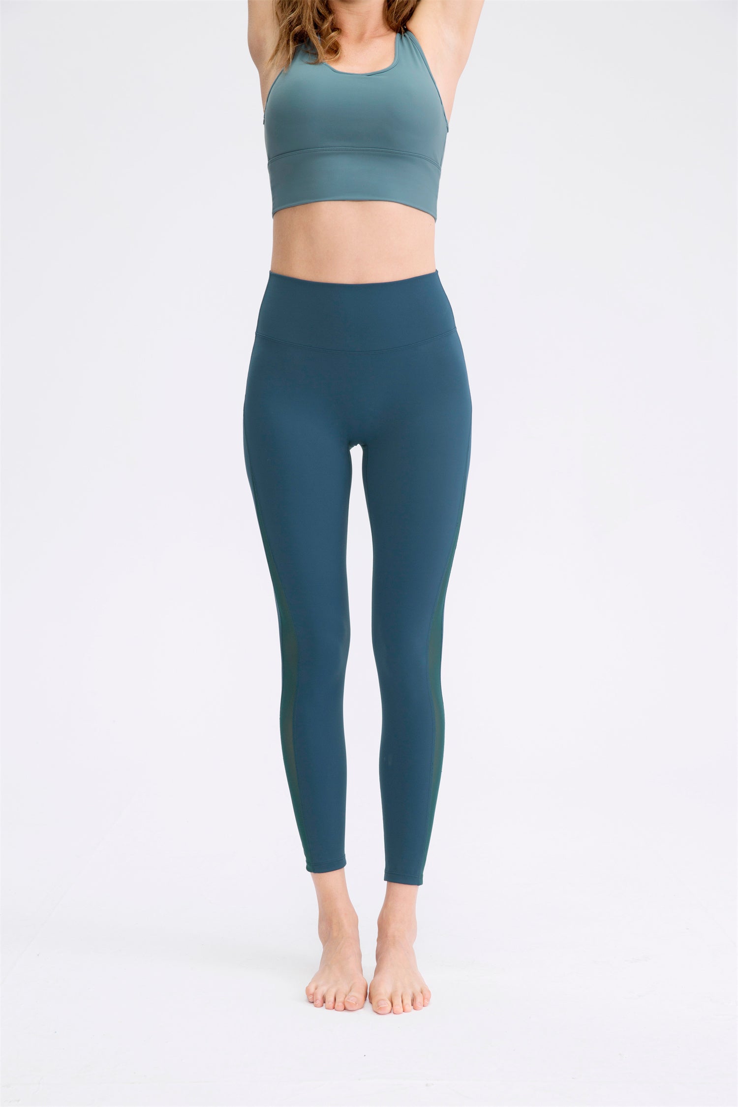 Hoog getailleerde sportlegging van mesh