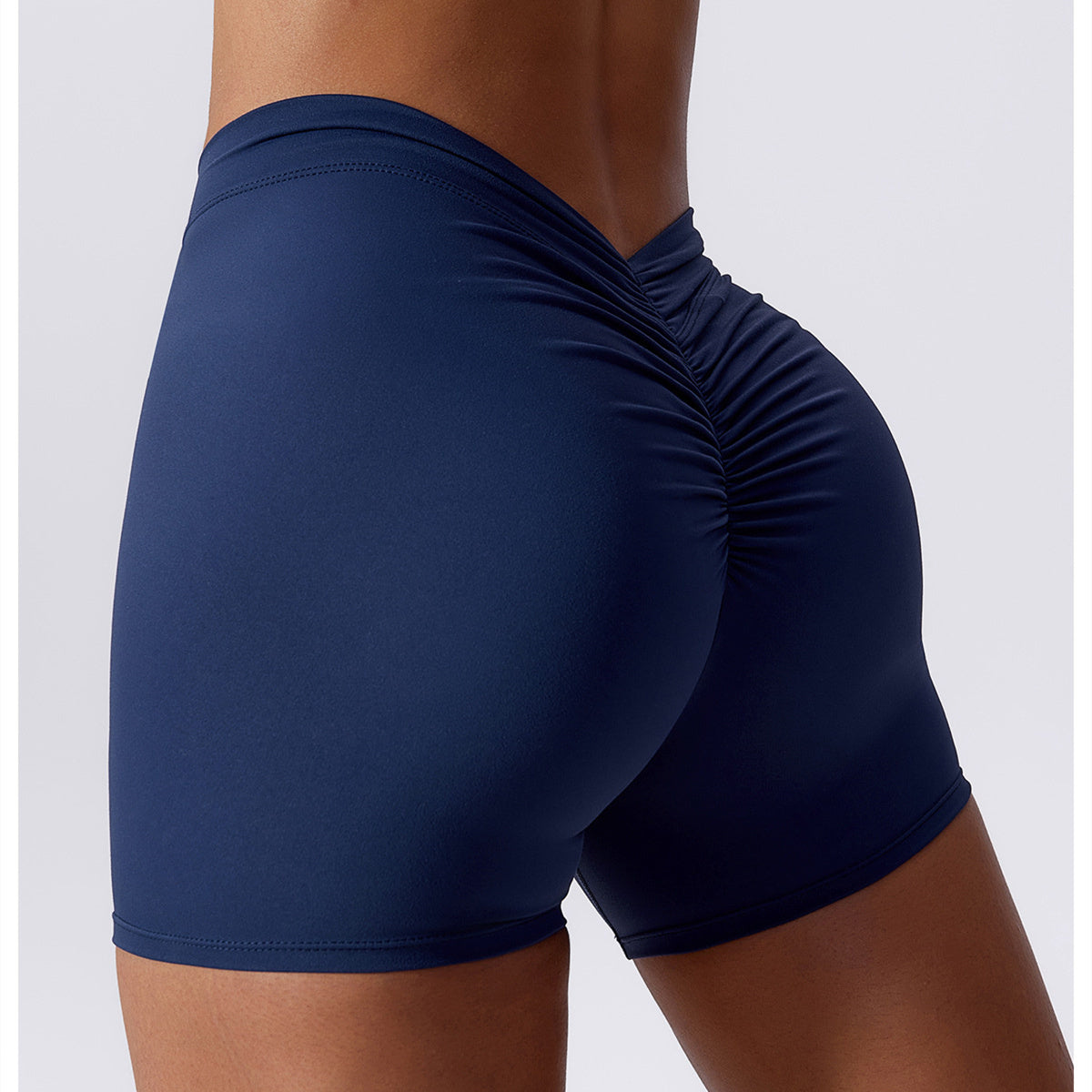 Hoog getailleerde V-vormige yogashort met ruches