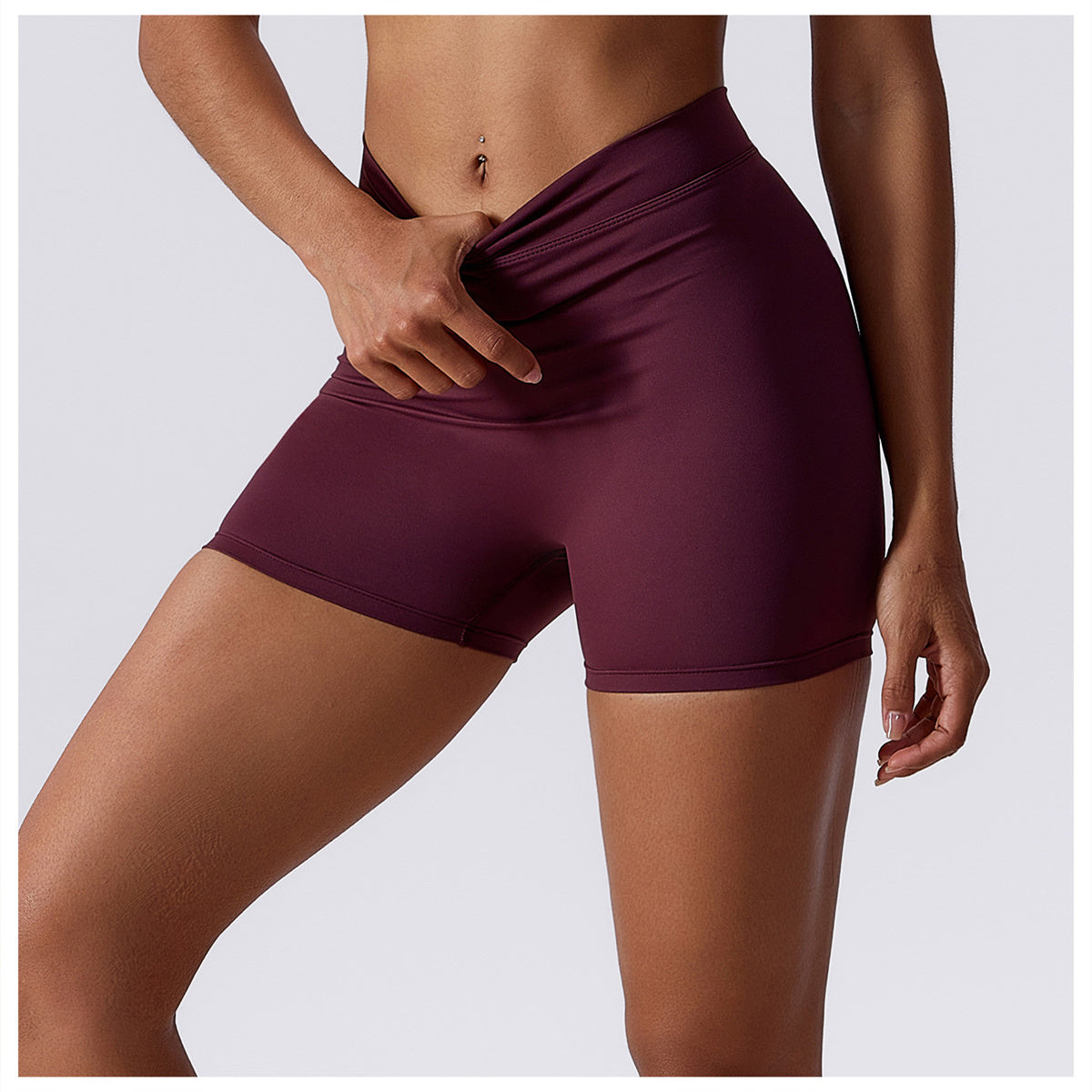 Hoog getailleerde V-vormige yogashort met ruches